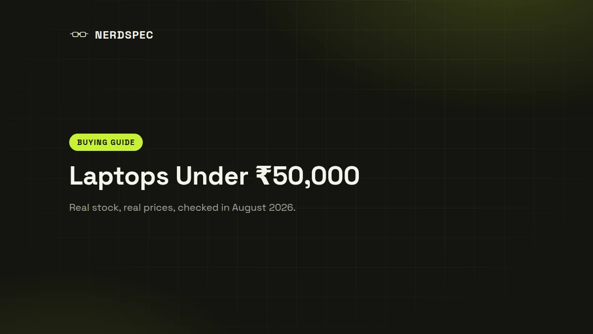 Budget Windows laptops under fifty thousand rupees lined up on a desk for comparison